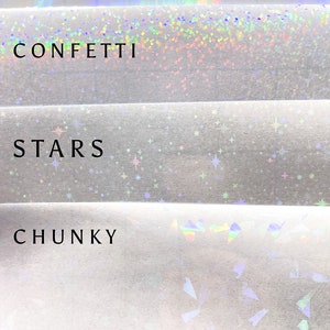 K&ouml;nnte beinhalten: Vier Muster von holografischem Vinyl mit verschiedenen Mustern: Standard, Konfetti, Sterne und Chunky. Der Text "HOLOGRAPHIC OPTIONS" befindet sich am unteren Rand des Bildes.