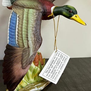 Flying duck by Lefton. This fine porcelain has been designed and executed with Leftons legendary quality and standards. Beautifully made