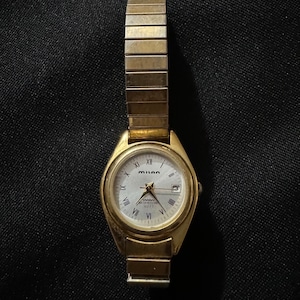 Milan gold stretch band