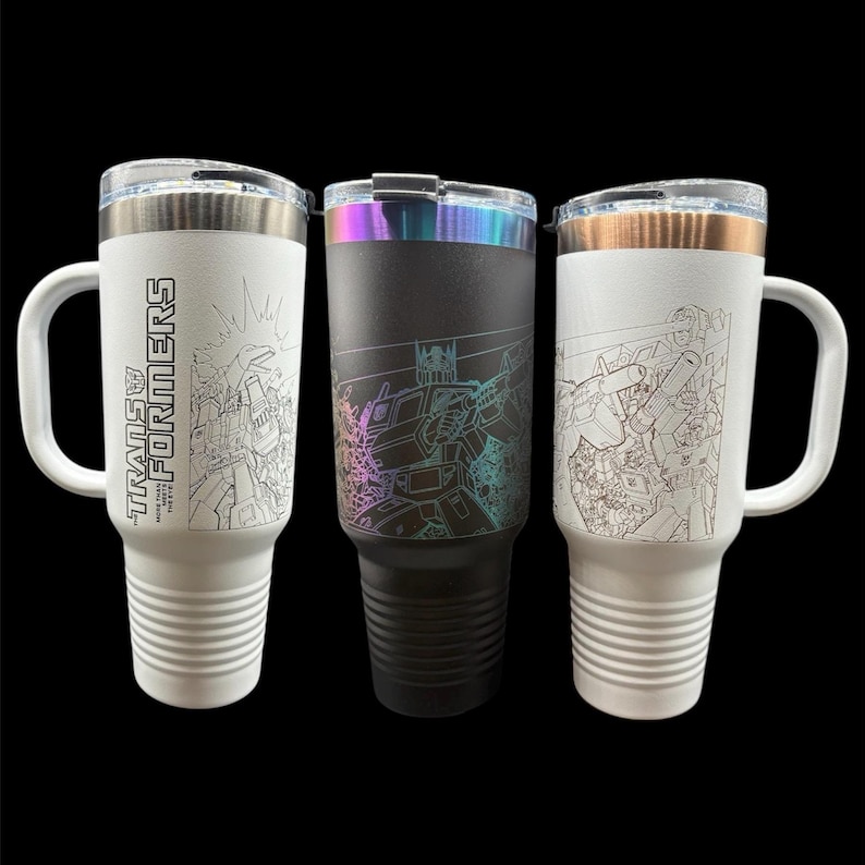 Transformers Travel Mug with Handle | Laser-Etched Transformers Battle Scene | Straw Included | Dishwasher Safe | Polar Camel image 1