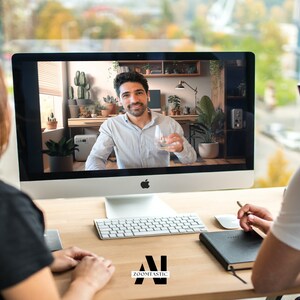 May include: Two people are having a video call on a computer. The person on the screen is holding a glass of water. The person on the left is looking at the screen, while the person on the right is looking at the screen and taking notes.