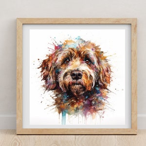 Könnte beinhalten: Aquarellmalerei eines Hundegesichts in einem Holzrahmen. Das Kunstwerk zeigt einen braun-weißen Hund mit farbenfrohen Farbspritzern in Blau-, Lila- und Orangetönen. Die Augen des Hundes sind braun.