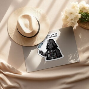 May include: A black and white illustration of Darth Vader holding a plastic water bottle. The text "Your lack of donation is disturbing" is above him.