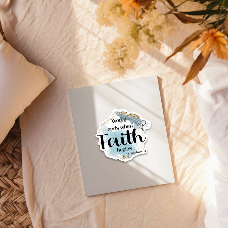 May include: A blue and gold sticker with the text "Worry ends when Faith begins" and the scripture reference "2 Corinthians 12:9".