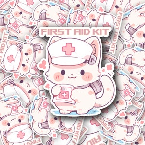 May include: A collection of stickers featuring a cartoon cat dressed as a nurse, holding a medicine bottle with a cross symbol. The stickers are primarily white and pink, with the text "FIRST AID KIT" on some. The cat has a medical cross on its hat.