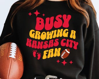 future kansas city Football fan, Busy Growing a KC Fan, football pregnancy announcement sweatshirt baby shower gift football maternity