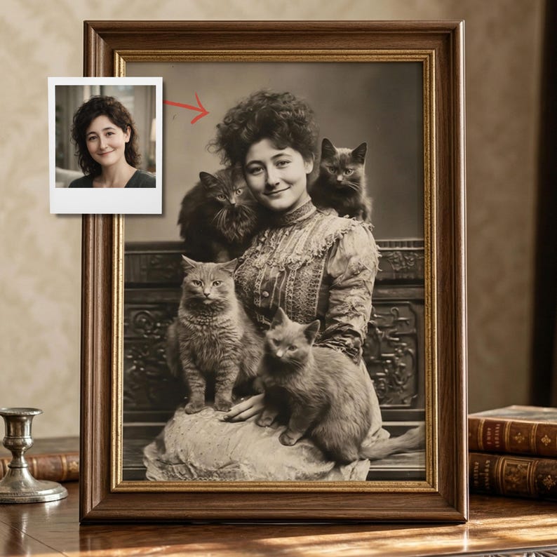 May include: A framed sepia-toned portrait of a woman surrounded by four cats. A smaller, modern color photograph of the woman is in the upper left corner. The frame is dark brown, and the image has a vintage aesthetic.
