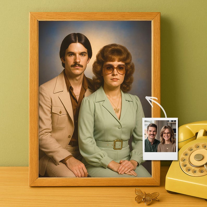 May include: A framed portrait of a couple in 1970s attire, featuring a person in a tan blazer and brown shirt next to a person in a light green belted dress with butterfly necklace and tinted glasses, with a small photo insert and yellow phone.