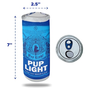May include: Blue and white plush dog toy shaped like a beer can. The can is 7 inches tall and 2.5 inches wide. The can has the words "Pup Light" and "Dog Toy Beer Can" printed on it. The can has a pull tab on top.