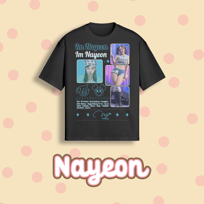 May include: Black t-shirt featuring the text "Im Nayeon" and images of Nayeon. The shirt has a crew neck and short sleeves. The design includes a signature and the word "Nayeon" in a pink and white font.