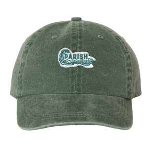 May include: A green, washed cotton baseball cap with an embroidered patch that says "PARISH" in white lettering with a teal wave design.