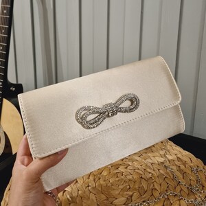 Black and ivory clutch bag online