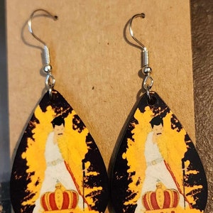 Freddie mercury hotsell earrings