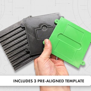 May include: Three pre-aligned templates in black and green are displayed. One template is green and held by a hand. The other two templates are black. The templates have a square shape with rounded corners and a unique design.