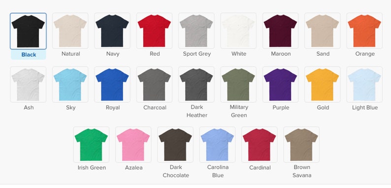 May include: A selection of t-shirts in various colors, including black, navy, red, and gray. The image displays a grid of shirts with color names like "Natural," "Ash," and "Carolina Blue" below each shirt. The shirts are displayed on a white background.