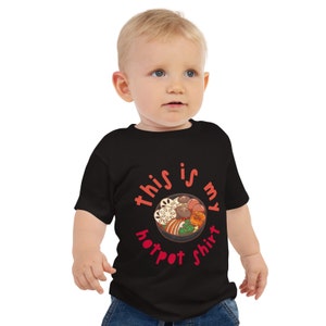 May include: A black baby t-shirt with a red graphic of a hot pot with the text "This is my hotpot shirt".