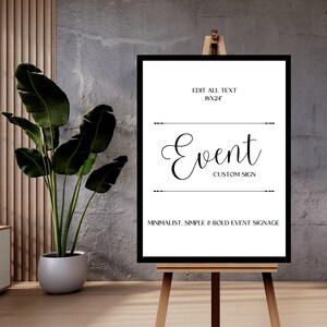 May include: Black and white printable sign with the text "Event Custom Sign" on a white background. The sign is 45.7 x 61 cm and is displayed on an easel. The text "Minimalist, Simple & Bold Event Signage" is at the bottom of the sign.