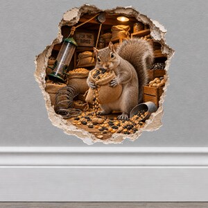 May include: A wall decal featuring a squirrel holding a burlap sack of seeds inside a wooden storage room. The scene is framed by a jagged hole effect. The room contains wooden crates, a bird feeder, and a sign that reads FOR THE BIRDS.