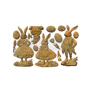 May include: A collection of decorative Easter-themed resin pieces. The set includes three anthropomorphic rabbits in vintage clothing, along with Easter eggs, flowers, and a butterfly, all in a weathered, antique gold color.