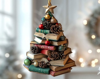 May include: A Christmas tree ornament crafted from stacked books, adorned with pinecones, small ornaments, and a gold star. The books are in shades of green, red, and brown, creating a festive and literary holiday decoration.