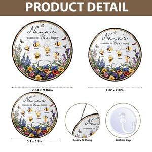 May include: Round decorative wall art with the text "Nana's reasons to Bee happy" featuring bee illustrations and floral accents. Available in 9.84 x 9.84 inches, 7.87 x 7.87 inches, and 5.9 x 5.9 inches. Includes a suction cup and ready-to-hang option.