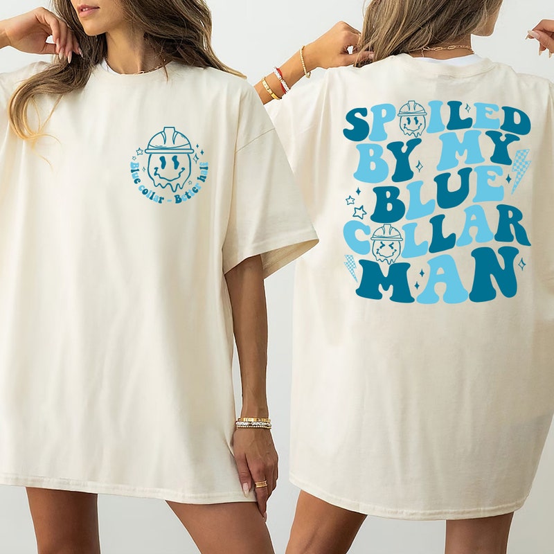 Blue Collar Wife DTF printed on Camo and Olive Foam Trucker Hat main image 0