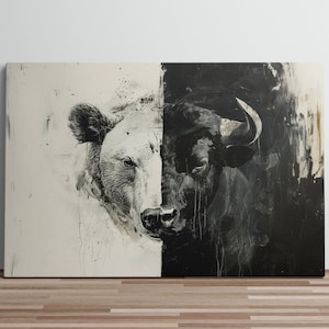 May include: A black and white abstract painting of a bear and a bull. The bear is on the left side of the painting and the bull is on the right side. The bear is white and the bull is black. The painting is done in a style that is reminiscent of street art.