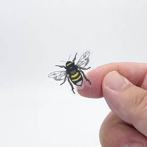 Bee sticker • Cute honey bee • Clear sticker • Waterproof • Dishwasher-safe • Ideal for a water bottle, laptop, tablet, Kindle, or phone
