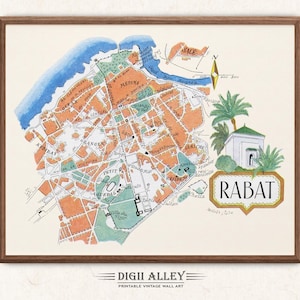 Può includere: Una mappa di Rabat, in Marocco, in stile vintage, con uno sfondo marrone chiaro e dettagli in arancione, verde e blu. La mappa mostra la disposizione della città con i nomi delle strade e i punti di riferimento. La parola "Rabat" è scritta in una cornice dorata in basso a destra.
