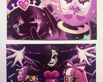 May include: Two colorful art prints featuring cartoon characters. The top print shows two figures with wings and crowns, in shades of purple and pink. The bottom print depicts three characters on a stage, one with a microphone, in a concert setting.