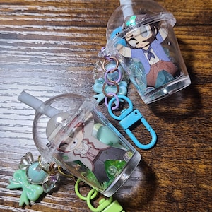 RDR2 - Cup Shaker Keychain