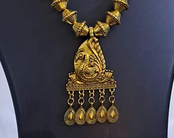 Yellow thread necklace with Golden oxidised traditional pendant