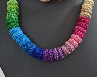 Exclusive multi coloured crochet necklace with colouful matching earrings.