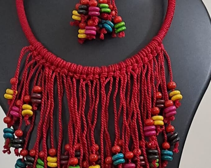 Exclusive red thread neckband with fringes and matching earrings.