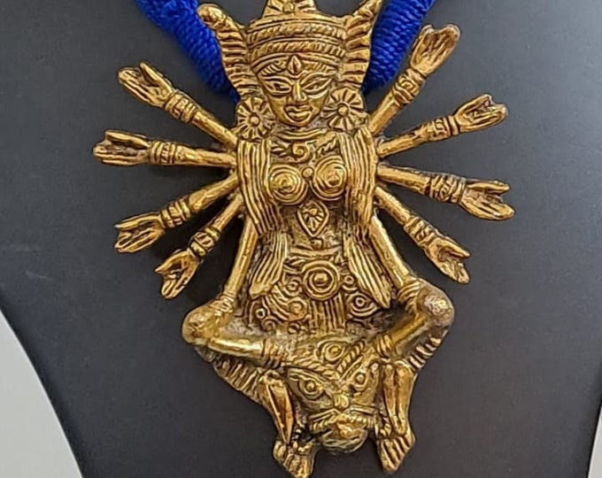 Blue thread necklace with oxidised golden durga pendant