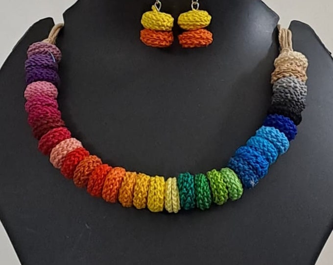 Exclusive multi coloured crochet necklace with colouful matching earrings.
