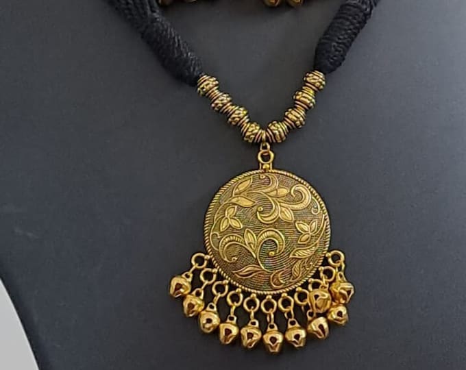 Black thread necklace with Golden oxidised traditional pendant