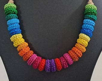 Exclusive multi coloured crochet necklace with colouful matching earrings.