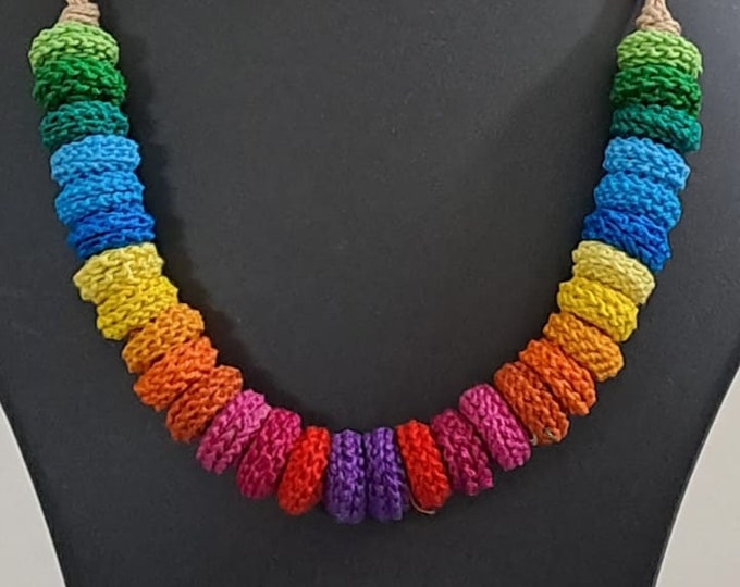 Exclusive multi coloured crochet necklace with colouful matching earrings.