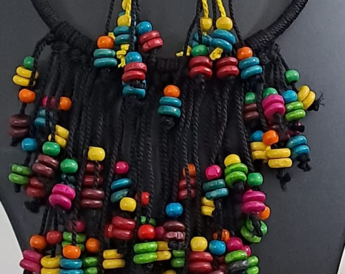 Exclusive black thread neckband with fringes and matching earrings.