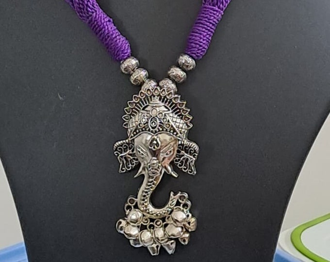Purple thread necklace with oxidised silver ganesha pendant