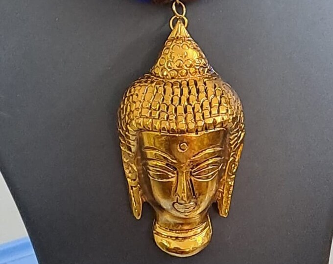 Blue thread necklace with golden oxidised buddha pendant