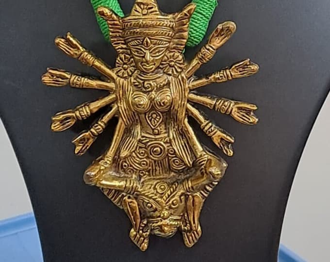 Green thread necklace with oxidised golden durga pendant