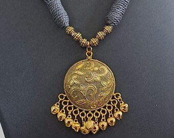 Grey thread necklace with Golden oxidised traditional pendant