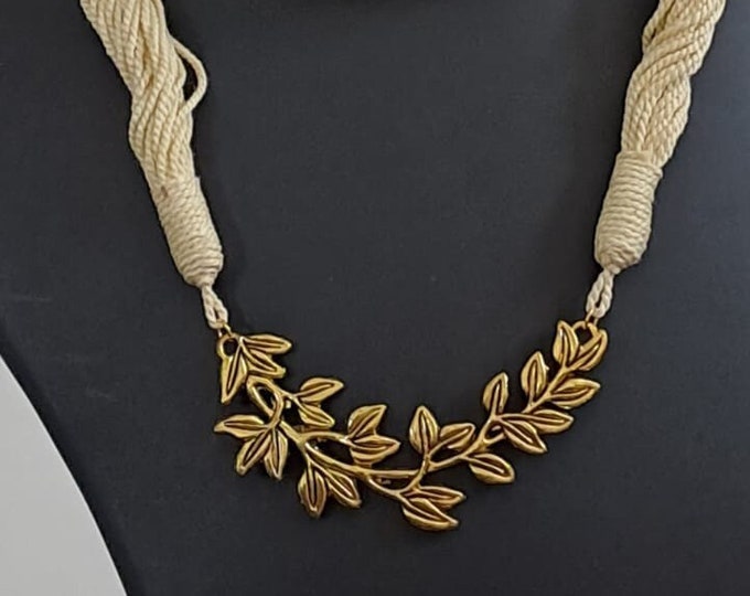 Off white thread necklace with Golden oxidised traditional pendant