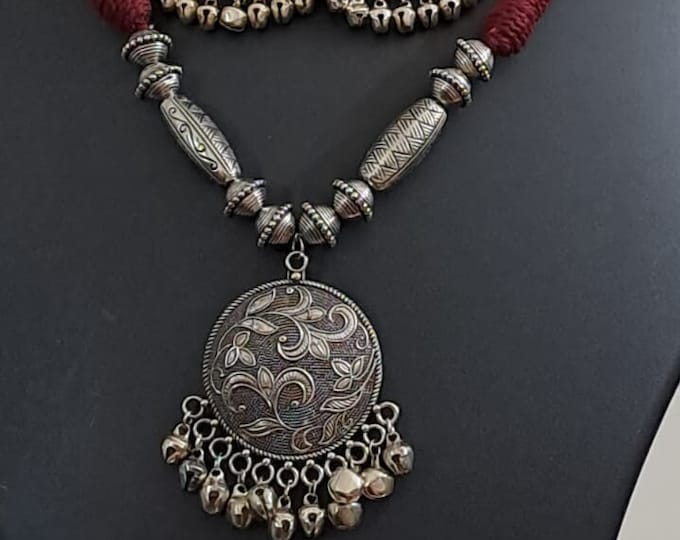 Maroon thread necklace with silver oxidised traditional pendant