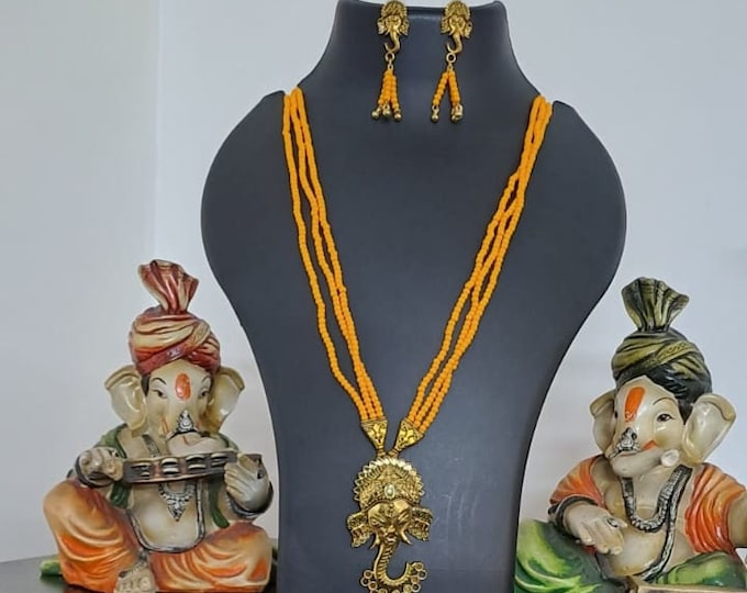 Orange seed beads necklace with Lord Ganesha pendant
