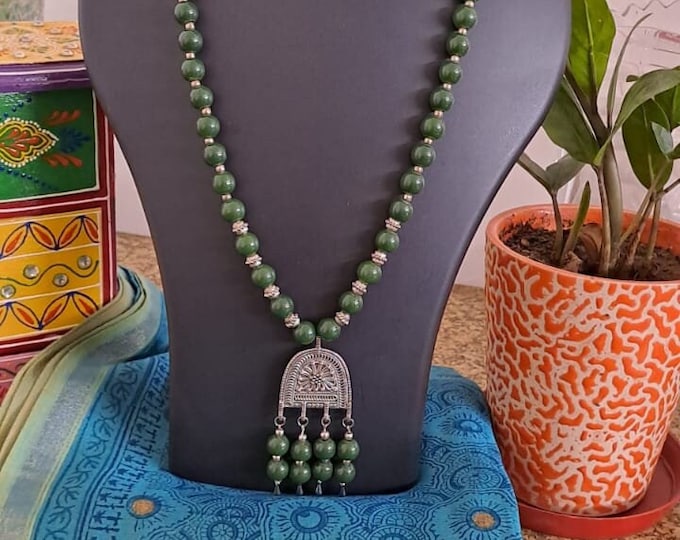 Green glass beads necklace with silver oxidised pendant