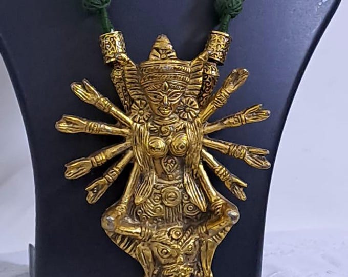 Green thread necklace with oxidised golden durga pendant