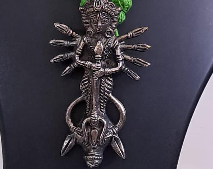 Green thread necklace with oxidised silver durga pendant